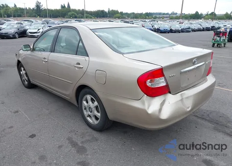2003 Toyota Camry Le z USA, uszkodzony, nr VIN 4T1BE32K93U728791